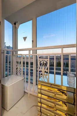 a balcony with a view of a large window at Reimi Mondo602 in Tokyo