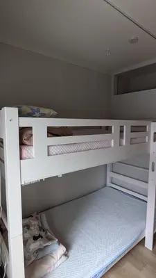 a white bunk bed in a room at Tokyo Skytree Tower\u30fbAsakusa Ashiana Guest House in Tokyo