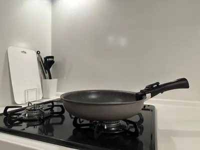 a pan sitting on top of a stove at nestay villa tokyo sugamo in Tokyo