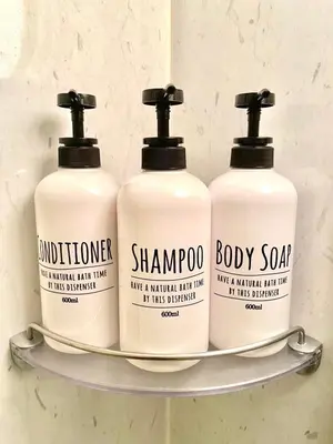 three bottles of shampoo and baby soap on a shelf at \u6b4c\u821e\u4f0e\u753a\u306e\u7269\u4ef65\u968e \u6771\u65b0\u5bbf\u99c5\u5f92\u6b693\u5206\u65b0\u5bbf\u6e0b\u8c37\u539f\u5bbf\u30a8\u30ea\u30a2 in Tokyo