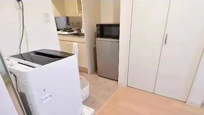 a kitchen with a printer in the middle of a room at Marvelous Kinshicho - Vacation STAY 61712v in Tokyo