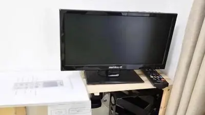 a computer monitor sitting on top of a desk at Marvelous Kinshicho - Vacation STAY 61712v in Tokyo