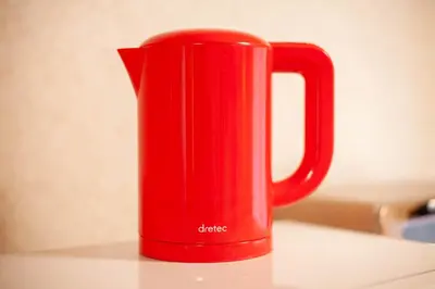 a red mug sitting on top of a table at Lucky Higashimizue \u30e9\u30c3\u30ad\u30fc\u6771\u745e\u6c5f in Tokyo