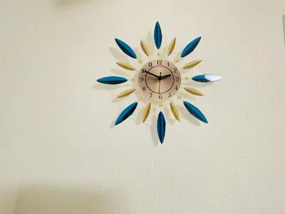 a clock is hanging on a wall at Y-shinjuku kabukicho-SJ0018 in Tokyo