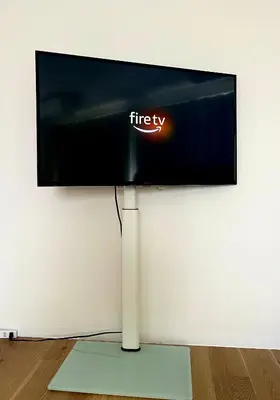 a flat screen tv hanging on a wall at home Shinjuku west302 in Tokyo
