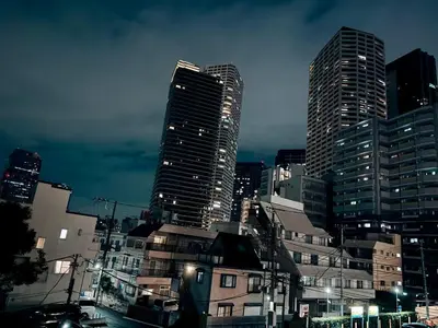 a city skyline at night with tall buildings at home Shinjuku west302 in Tokyo