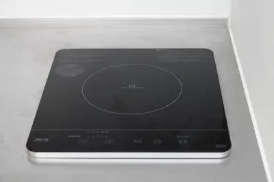 a tablet computer sitting on top of a counter at IKEBUKURO MANGA HOUSE in Tokyo