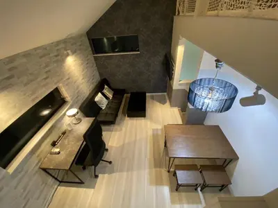an overhead view of a living room with a table and chairs at Building A - Vacation STAY 15789 in Tokyo