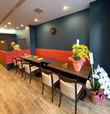 a dining room with a table and chairs at Hostel Wasabi Asakusa in Tokyo