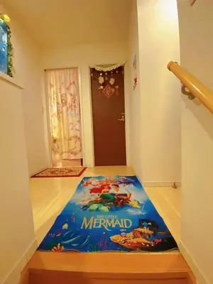a room with a mermaid mattress on the floor at yiyi tokyo disney minpaku in Tokyo