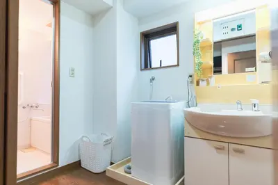 a bathroom with a sink and a toilet and a shower at HARMONIA\u6771\u4eac\u5800\u5207403 in Tokyo