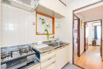 a kitchen with a sink and a stove at Bright Modern Airbnb in Tokyo's Northern District in Tokyo