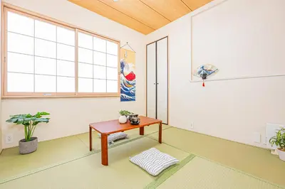 a room with a table and a window at Bright Modern Airbnb in Tokyo's Northern District in Tokyo