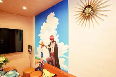 a room with a wall with a painting on it at Itabashi Ekimae - Diamond Yu in Tokyo