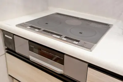 a tv sitting on top of a kitchen counter at Itabashi Ekimae - Diamond Yu in Tokyo