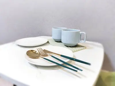 a table with two plates and two cups and utensils at Z22\u65b0\u5bbf\u6700\u4e2d\u5fc3 \u6771\u65b0\u5bbf\u7ad95\u5206-Shinjuku center 5 mins to Station, Max 4 \u76f4\u8fbe\u65b0\u5bbf \u6d89\u8c37 \u8868\u53c2\u9053 \u6c60\u888b \u4e0a\u91ce \u4ee3\u4ee3\u6728 \u94f6\u5ea7 \u539f\u5bbf in Tokyo