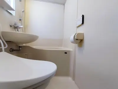 a bathroom with a white toilet and a sink at S21\u65b0\u5bbf\u6700\u4e2d\u5fc3 \u6771\u65b0\u5bbf\u7ad95\u5206-Shinjuku center 5 mins to Station, Max 3P \u76f4\u8fbe\u65b0\u5bbf \u6d89\u8c37 \u8868\u53c2\u9053 \u6c60\u888b \u4e0a\u91ce \u4ee3\u4ee3\u6728 \u94f6\u5ea7 \u539f\u5bbf in Tokyo