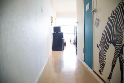 a hallway with a zebra painting on the wall at S19\u65b0\u5bbf\u6700\u4e2d\u5fc3 \u6771\u65b0\u5bbf\u7ad95\u5206-Shinjuku center 5 mins to Station, Max 6P \u76f4\u8fbe\u65b0\u5bbf \u6d89\u8c37 \u8868\u53c2\u9053 \u6c60\u888b \u4e0a\u91ce \u4ee3\u4ee3\u6728 \u94f6\u5ea7 \u539f\u5bbf in Tokyo