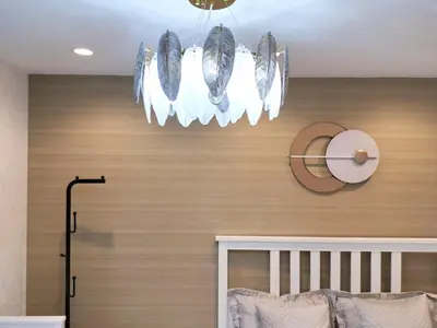 a chandelier hanging above a bed in a bedroom at S13-Shibuya center 7 mins to Station, Max 4P\u6d89\u8c37\u6700\u4e2d\u5fc3 \u6d89\u8c37\u7ad97\u5206 in Tokyo