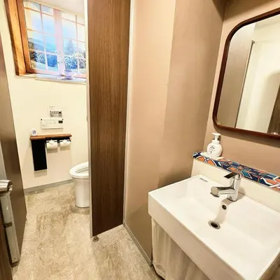 a bathroom with a sink and a toilet at supiahouse in Tokyo