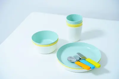 a table with two cups and a plate with a fork and knife at Craft302 \u6d45\u8349 \u30b9\u30ab\u30a4\u30c4\u30ea\u30fc\u8fd1\u304f \u8cb8\u5207\u6700\u59275\u4eba \u6771\u4eac\u89b3\u5149\u306b\u6700\u9069 \u7121\u6599WiFi in Tokyo