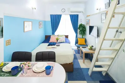 a small room with a bed and a ladder at SC 103 Cozy Private Stay with Loft Near Station Free WiFi in Tokyo
