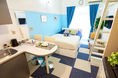 a small room with a bed and a sink at SC 103 Cozy Private Stay with Loft Near Station Free WiFi in Tokyo
