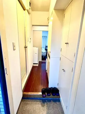 a hallway leading to a room with a hallway at Shibuya Honmachi Hana House in Tokyo