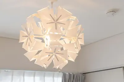 a chandelier hanging from a ceiling in a room at Lido East Shinagawa\u3000 in Tokyo