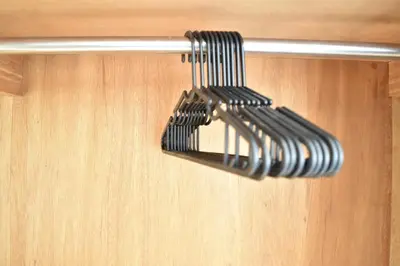 a black object is hanging on a door at \u6075\u6bd4\u5bff\u4e8c\u4e01\u76ee\u6238\u5efa in Tokyo
