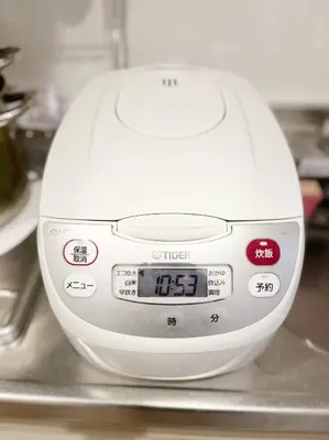 a white mixer sitting on top of a counter at LuckyHouse\u6d45\u8349 \u6210\u7530\u7fbd\u7530\u76f4\u884c in Tokyo