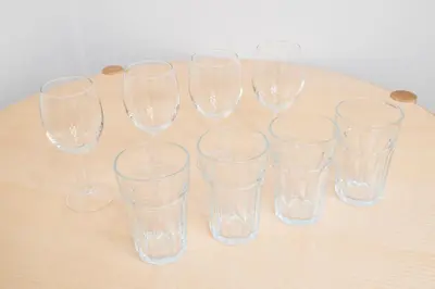 a group of clear glasses sitting on a table at GIVE Kagurazaka in Tokyo