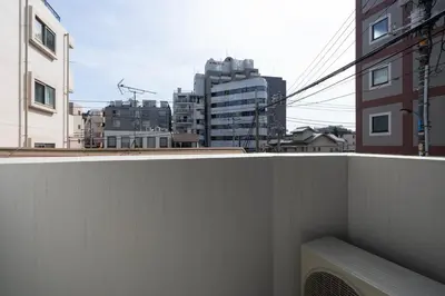 a view of a city skyline from a balcony at Gran Paseo\u795e\u697d\u5742 in Tokyo