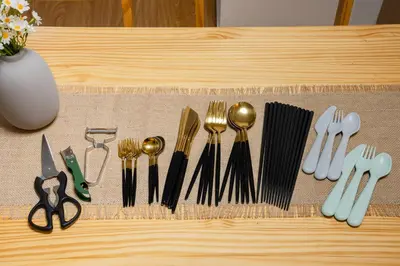 a table with utensils on a cutting board at SKY Building 201 - Easy Airport Access & Comfortable Stay in Tokyo