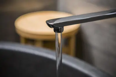 a stream of water coming out of a faucet at Hotel Ryumeikan Ochanomizu Honten in Tokyo