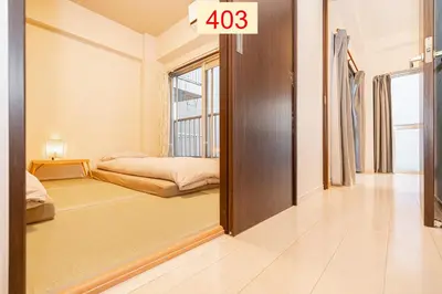 a room with a mirror with a bed in it at Downtown Apartment/ SHIBUYA Station 10mins on foot in Tokyo