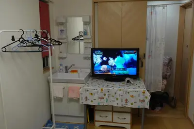 a television sitting on a table in a room at WOMEN ONLY 3F in Tokyo