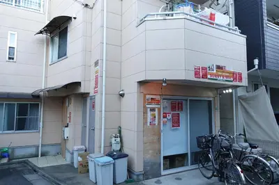 a building with bikes parked in front of it at WOMEN ONLY 3F in Tokyo