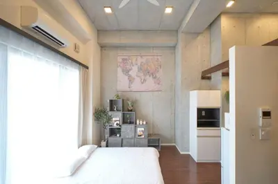 a bedroom with a bed and a map on the wall at Kiyosumi SOHO4B, 5th floor, 6th floor - Vacation STAY 45401v in Tokyo