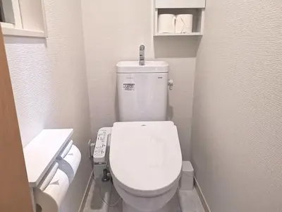a small bathroom with a white toilet and towels at KIK HOUSE-Self Check in- Will send room number and password in Tokyo