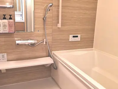 a bathroom with a bath tub and a sink at KIK HOUSE-Self Check in- Will send room number and password in Tokyo