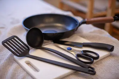 a frying pan and utensils sitting on a table at \u30e9\u30d3\u30c8\u30f3\u30d3\u30eb in Tokyo