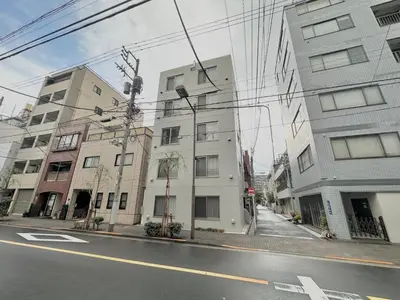 an apartment building on a city street at Hotel \u30de\u30fc\u30d9\u30e9\u30b9Asakusa#LOFT#2 in Tokyo