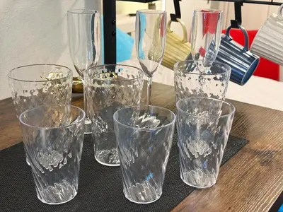 a group of glasses sitting on a table at Caesar House Connecting Room 201and202 in Tokyo