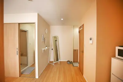a room with a hallway with a mirror at QU301 Edogawa Japanese Style Apartment 301 has direct access to Akihabara and Shinjuku, with convenient transportation and free WiFi in Tokyo