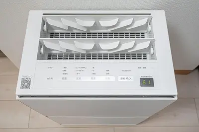 an open dishwasher with a digital clock in it at Ikebukuro East Exit, 2BR in Tokyo