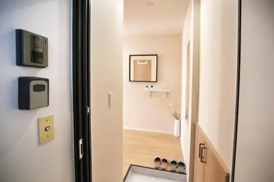 a small bathroom with a sink and a mirror at QU201 Edogawa Japanese Style Apartment 201 has direct access to Akihabara and Shinjuku, with convenient transportation and free WiFi in Tokyo
