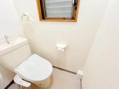 a bathroom with a toilet and a sink and a mirror at Tokyo Skytree Residence Inn (F2) in Tokyo
