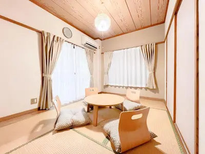 a dining room with a table and chairs at Tokyo Skytree Residence Inn (F2) in Tokyo