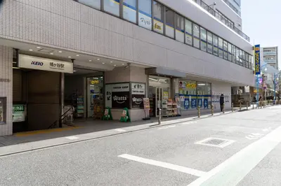 an empty street in front of a building at Lega land\u5e61\u30f6\u8c37 in Tokyo